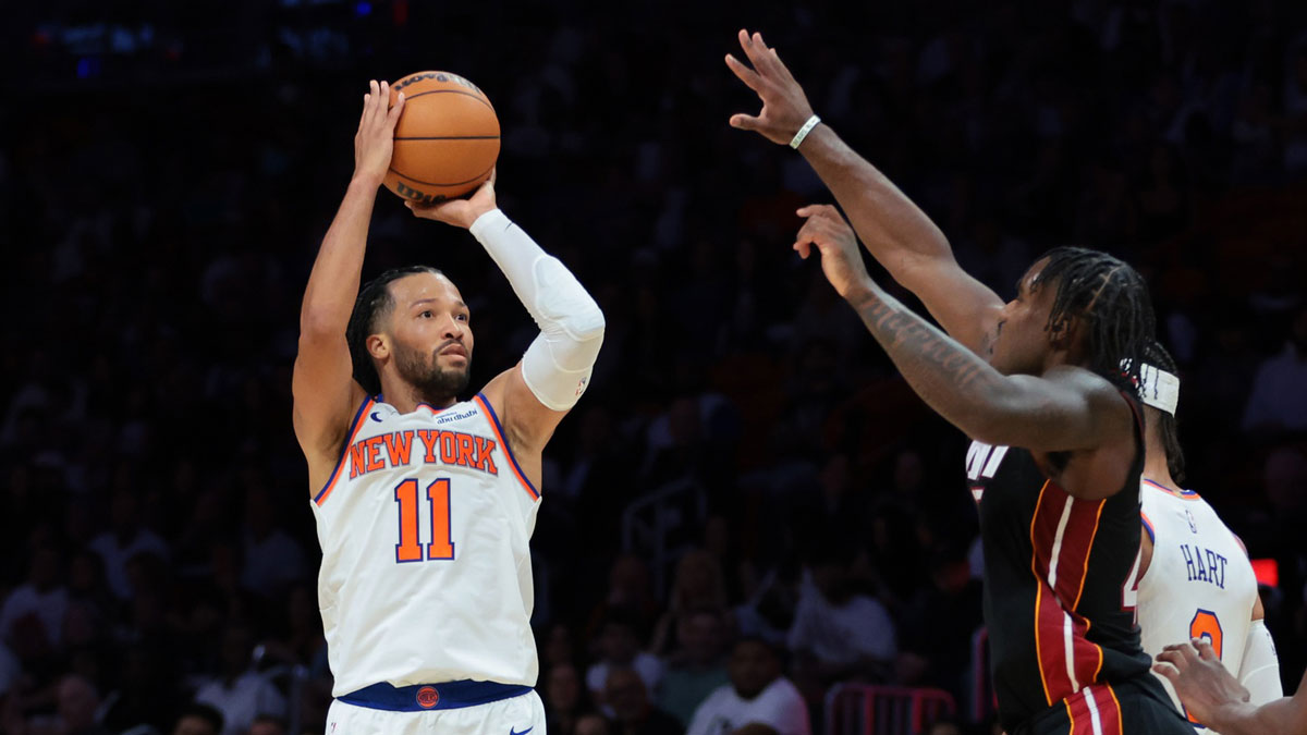 New York Knicks guard Jalen Brunson (11) shoots the basketball against Miami Heat guard Davion Mitchell (45) during the fourth quarter at Kaseya Center