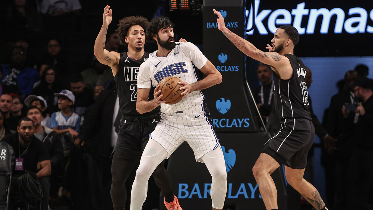 Orlando Magic center Goga Bitadze (35) controls the ball against Brooklyn Nets forward Jalen Wilson (22) and guard Tyrese Martin (13) in the first quarter at Barclays Center.