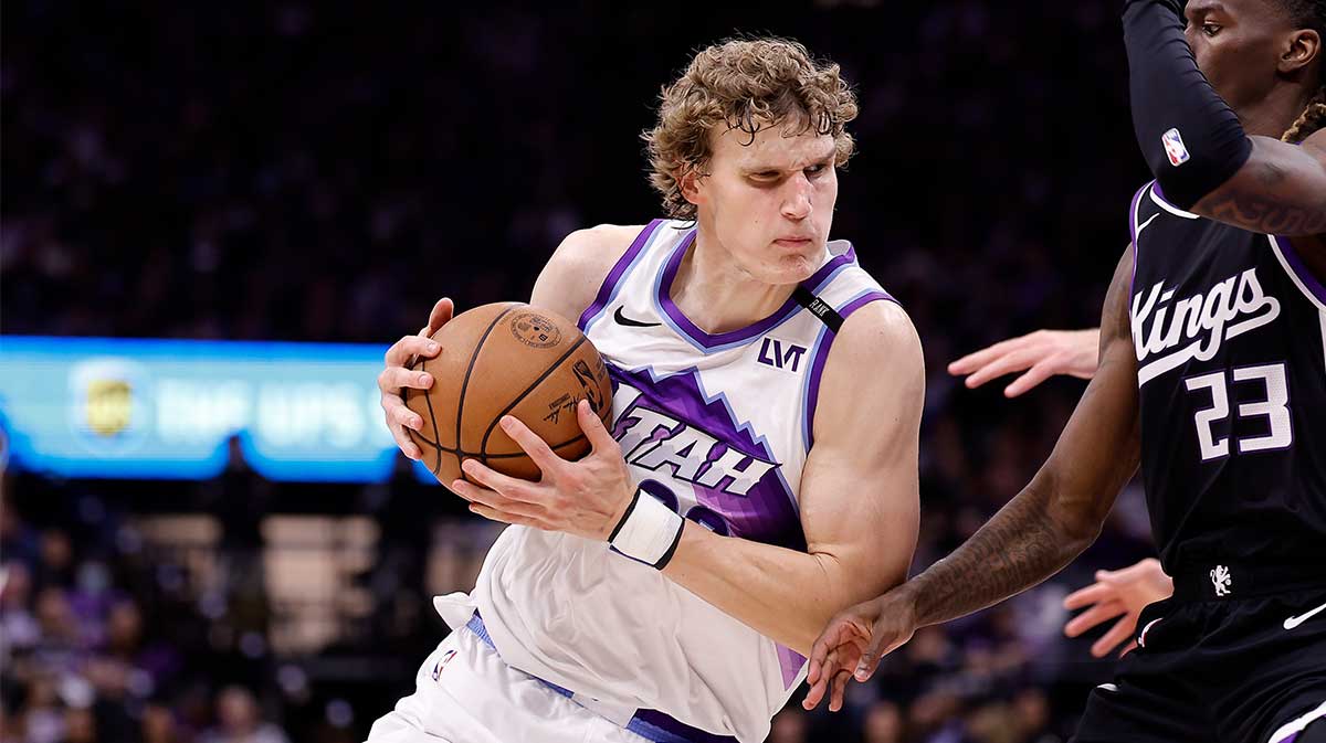 Utah Jazz forward Lauri Markkanen (23) drives in against Sacramento Kings guard Keon Ellis (23) during the third quarter at Golden 1 Center.
