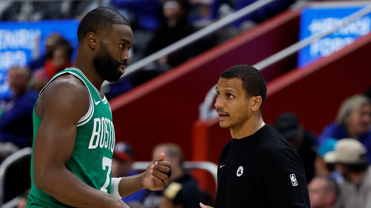 Boston Celtics head coach Joe Mazzulla talks to guard Jaylen Brown (7) in the second half against the Detroit Pistons at Little Caesars Arena
