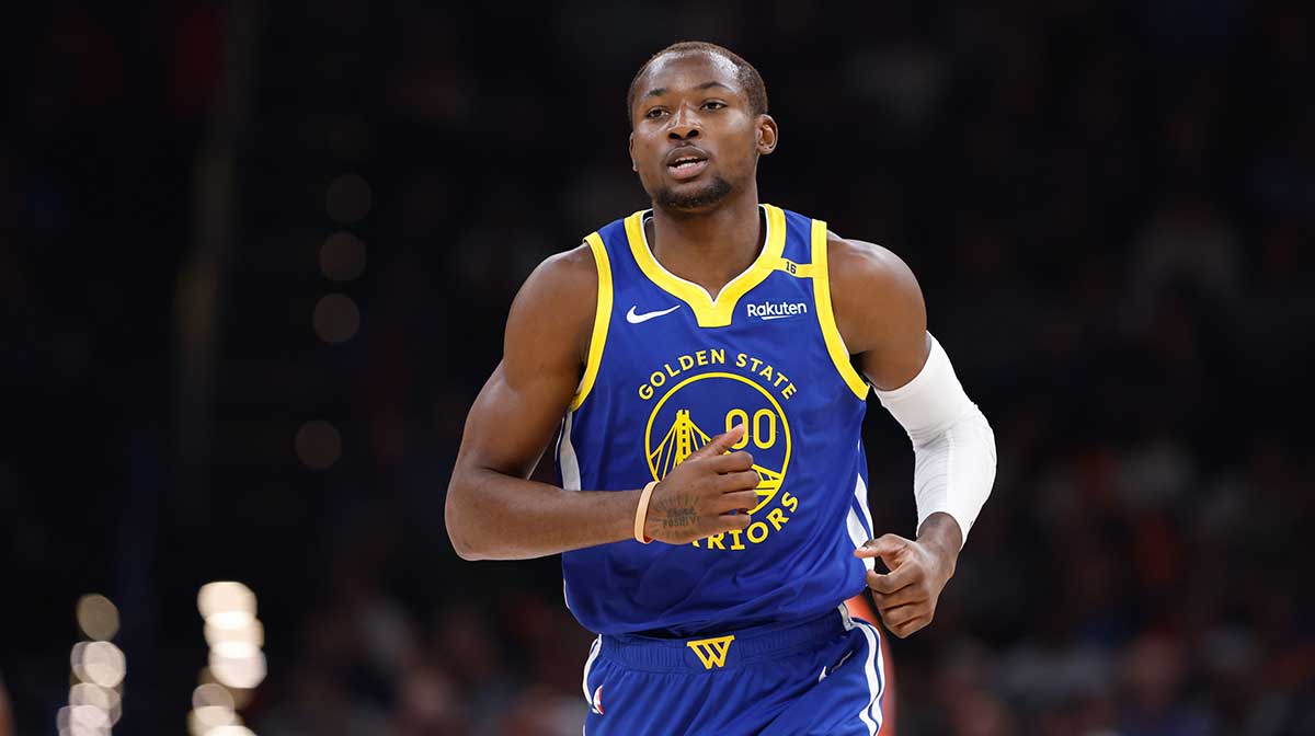 Golden State Warriors forward Jonathan Kuminga (00) runs down the court against the Oklahoma City Thunder during the second quarter at Paycom Center.
