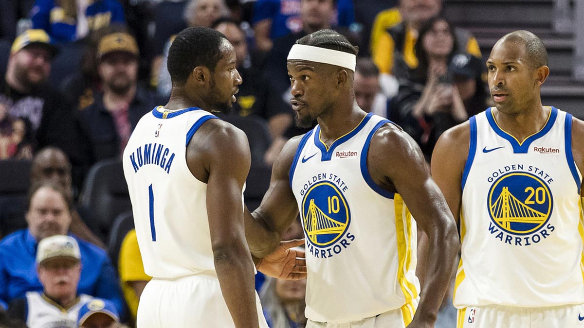 Golden State Warriors forward Jimmy Butler III (10) reacts towards forward Jonathan Kuminga (1) during the second quarter against the Portland Trail Blazers at Chase Center.