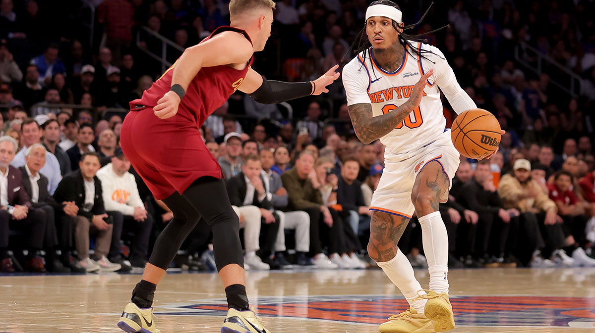 New York Knicks guard Jordan Clarkson (00) controls the ball against Cleveland Cavaliers guard Sam Merrill (5) during the fourth quarter at Madison Square Garden.