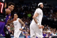 Dallas Mavericks forward Anthony Davis (3) looks back and smiles after securing a triple...