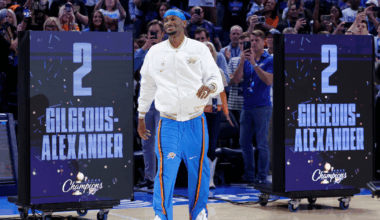 Oct 21, 2025; Oklahoma City, Oklahoma, USA; Oklahoma City Thunder guard Shai Gilgeous-Alexander walks onto the court during the championship ring and banner ceremony before the start of their game against the Houston Rockets at Paycom Center. Mandatory Credit: Alonzo Adams-Imagn Images