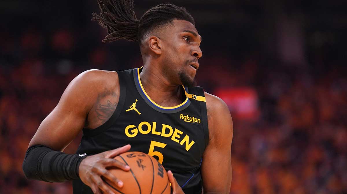 Golden State Warriors forward Kevon Looney (5) holds onto a rebound against the Minnesota Timberwolves in the first quarter during game four of the second round for the 2025 NBA Playoffs at Chase Center.