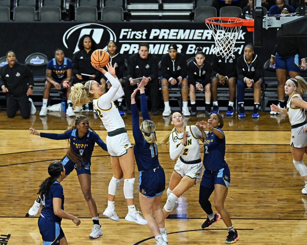 North Dakota State forward Avery Koenen is shoots over defenders in the 2025 Summit League Tournament in Sioux Falls, SD.