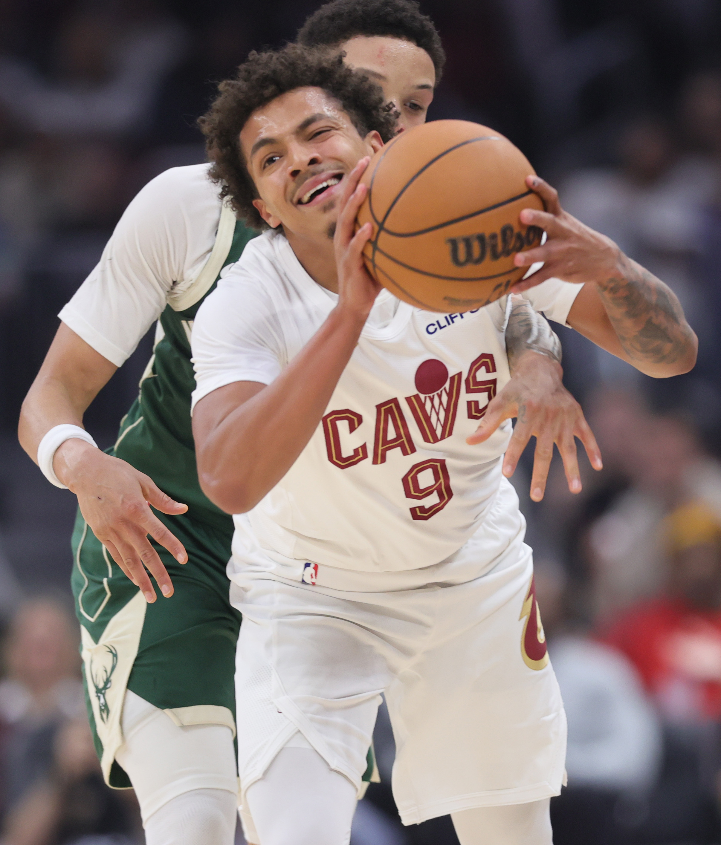 Cleveland Cavaliers guard Craig Porter Jr. steals the pass away from Milwaukee Bucks guard Ryan Rollins for a turnover in the first half at Rocket Arena. 