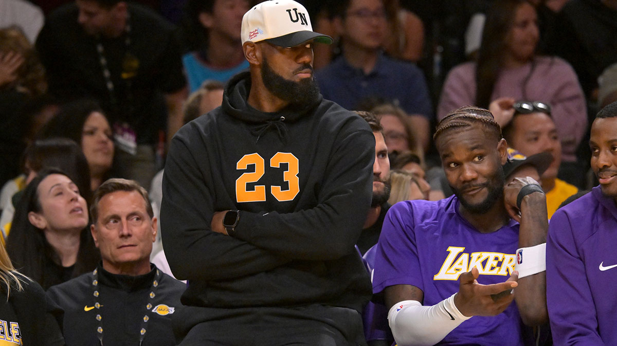 Los Angeles Lakers forward Lebron James (23) looks on from the bench during the first half against the Golden State Warriors at Crypto.com Arena.