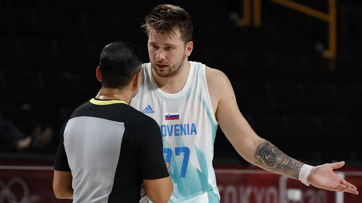 Team Slovenia point guard Luka Doncic (77) questions a call after a technical foul in the second quarter against Australia during the Tokyo 2020 Olympic Summer Games at Saitama Super Arena.