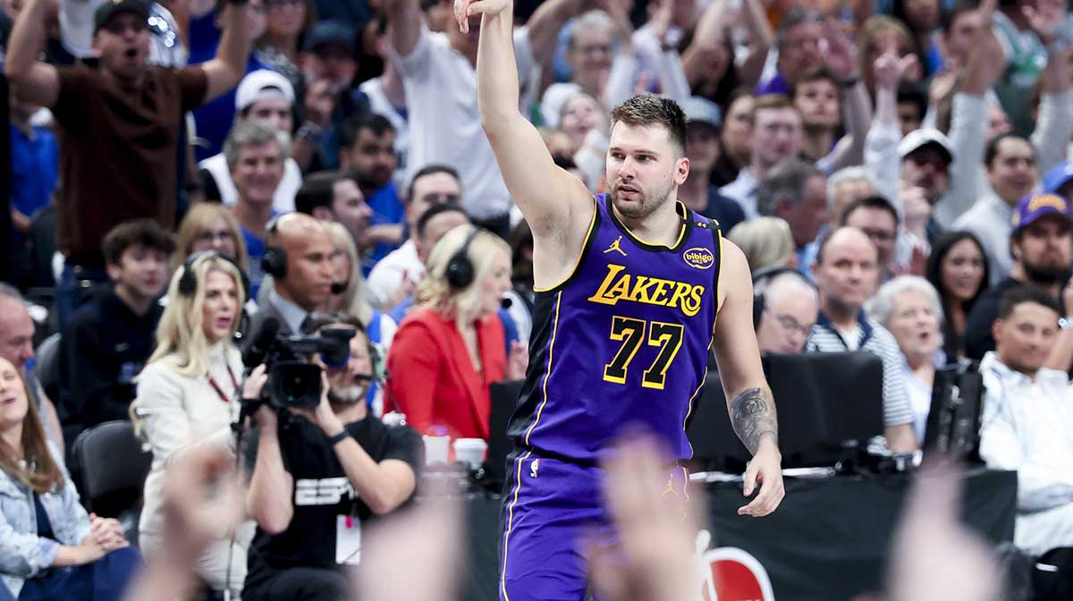 Los Angeles Lakers guard Luka Doncic (77) reacts after scoring against the Dallas Mavericks during the second quarter at American Airlines Center.
