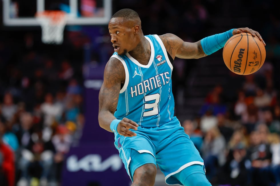 Former Charlotte Hornets star Terry Rozier was arrested by the FBI in connection to a sports...