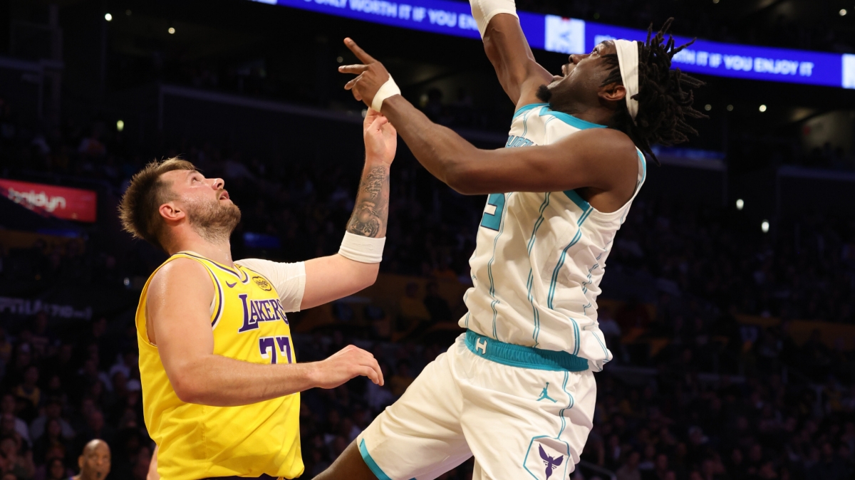 Charlotte Hornets center Mark Williams (5) shoots against Los Angeles Lakers guard Luka Doncic (77) during the third quarter at Crypto.com Arena.