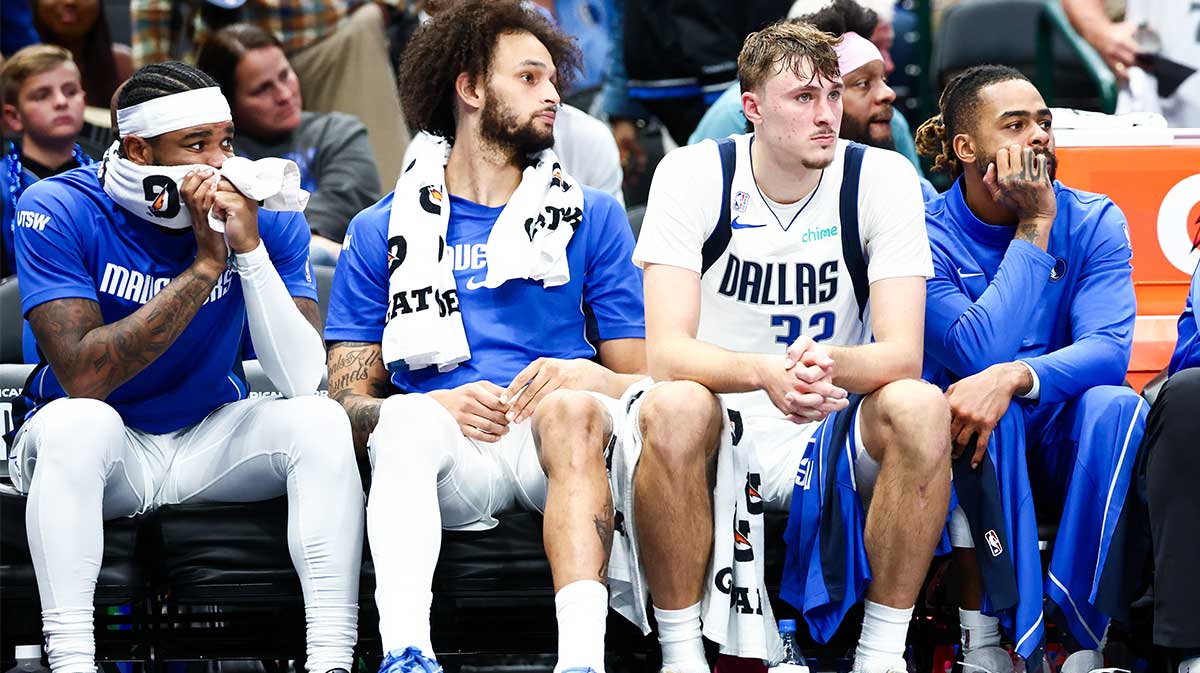 Dallas Mavericks guard Jaden Hardy (1) and Dallas Mavericks center Dereck Lively II (2) and Dallas Mavericks forward Cooper Flagg (32) react against the San Antonio Spurs during the second half at American Airlines Center.