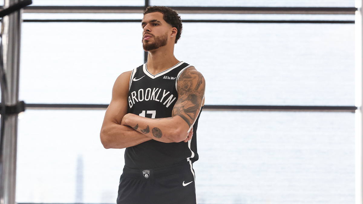 Brooklyn Nets forward Michael Porter Jr. (17) and Toronto Raptors guard Ja'Kobe Walter (14) battle for the ball during the third quarter at Scotiabank Arena.