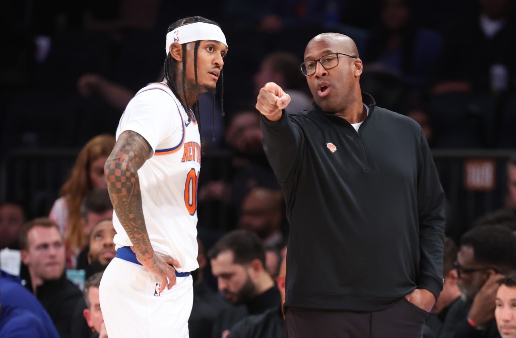 Head coach Mike Brown talks with Jordan Clarkson during the Knicks' preseason loss to the Wizards on Oct. 13, 2025.
