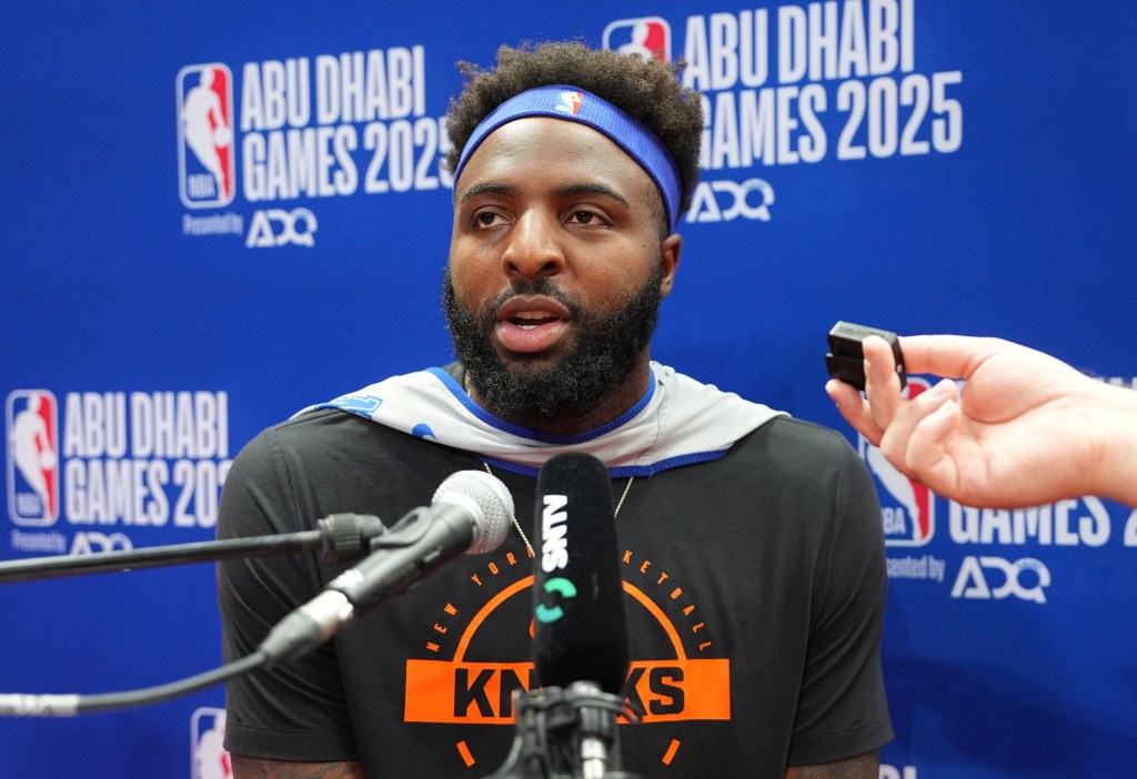 Mitchell Robinson talks to the media earlier this month.