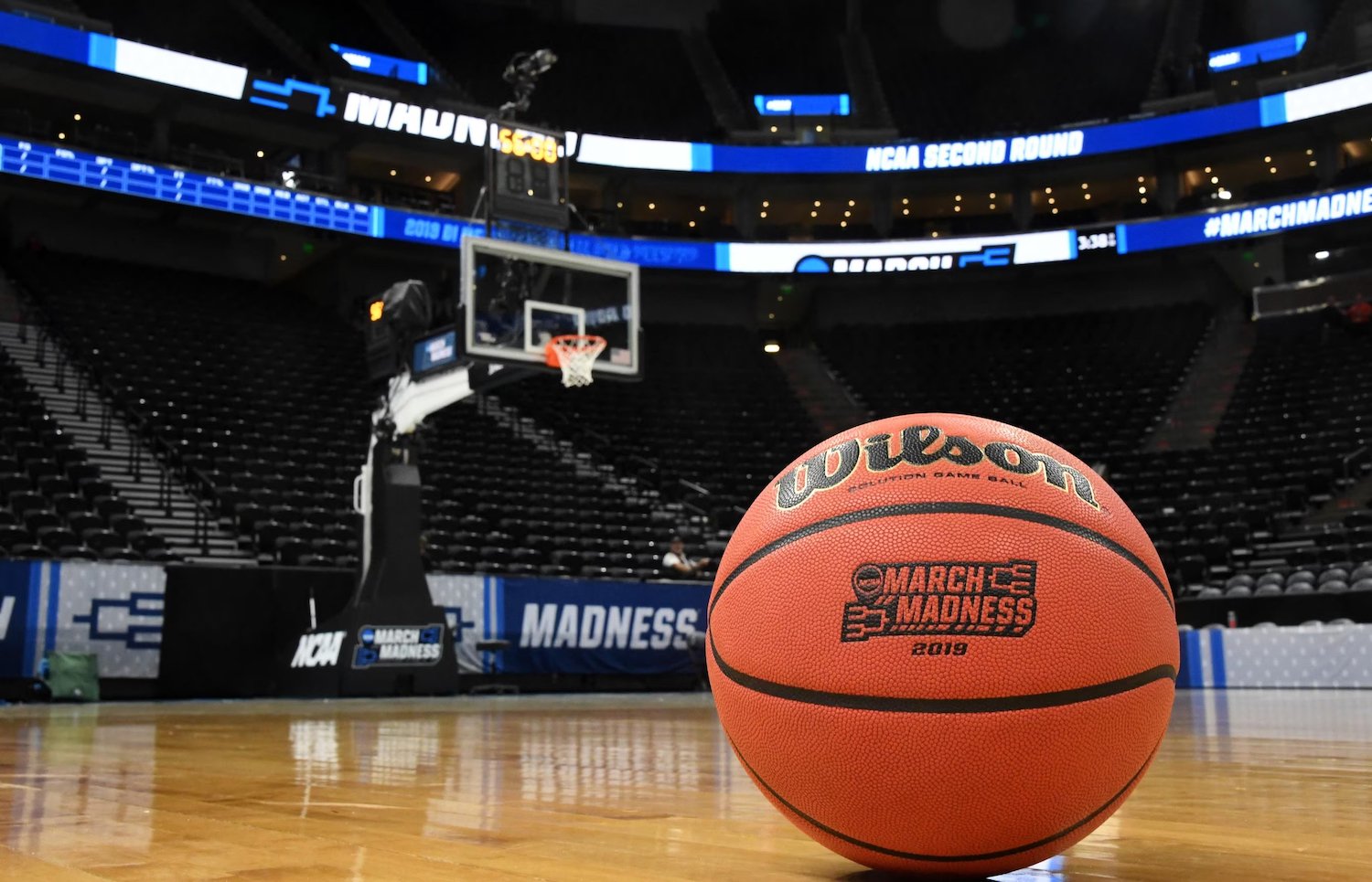 The 2025 NCAA March Madness Basketball tournament featuring a basketball on a court before a game