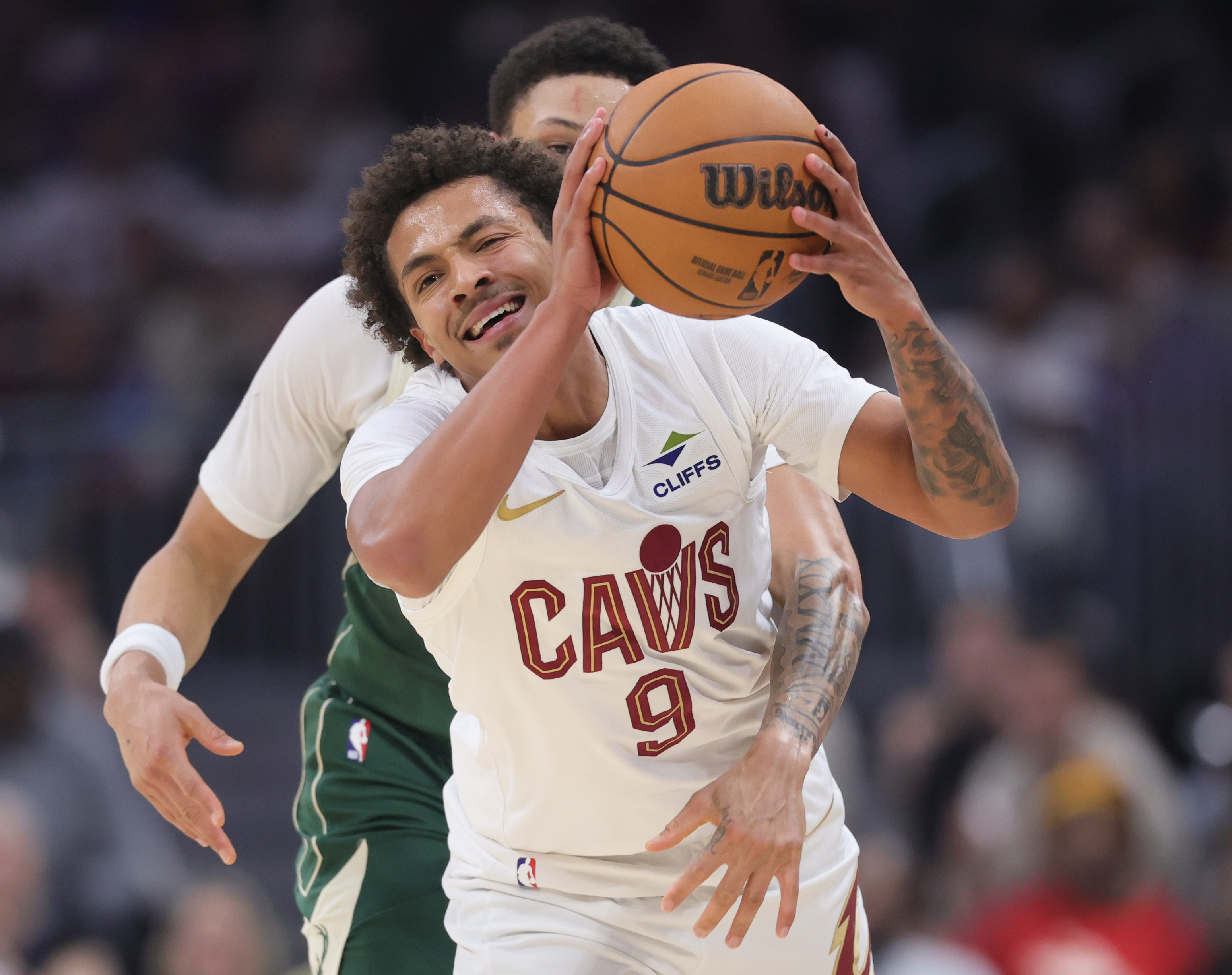 Cleveland Cavaliers guard Craig Porter Jr. steals the pass away from Milwaukee Bucks guard Ryan Rollins for a turnover in the first half at Rocket Arena. 