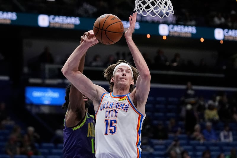Oklahoma City Thunder center Branden Carlson is fouled by New Orleans Pelicans guard Antonio Reeves during game in New Orleans, Sunday, April 13, 2025.