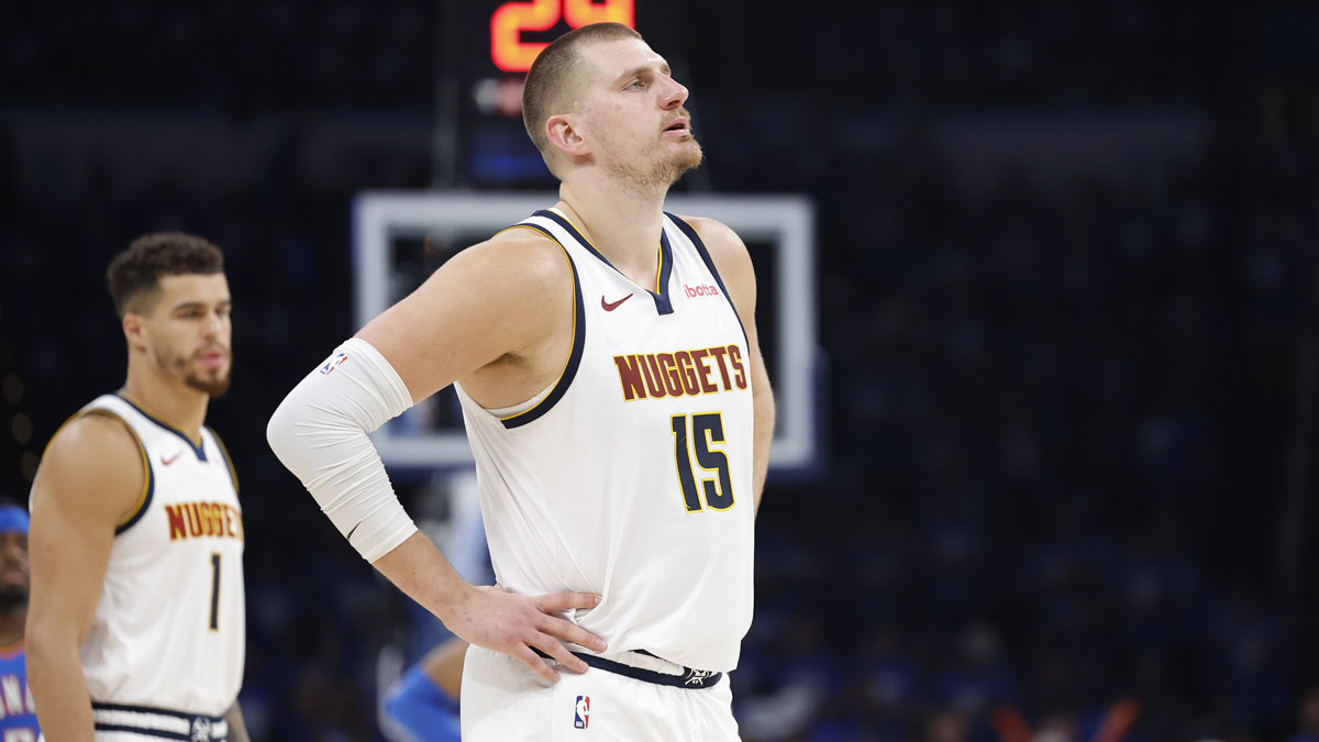 Denver Nuggets center Nikola Jokic (15) watches Oklahoma City Thunder guard Shai Gilgeous-Alexander shoot free throws in the second half of game seven of the second round for the 2025 NBA Playoffs at Paycom Center.
