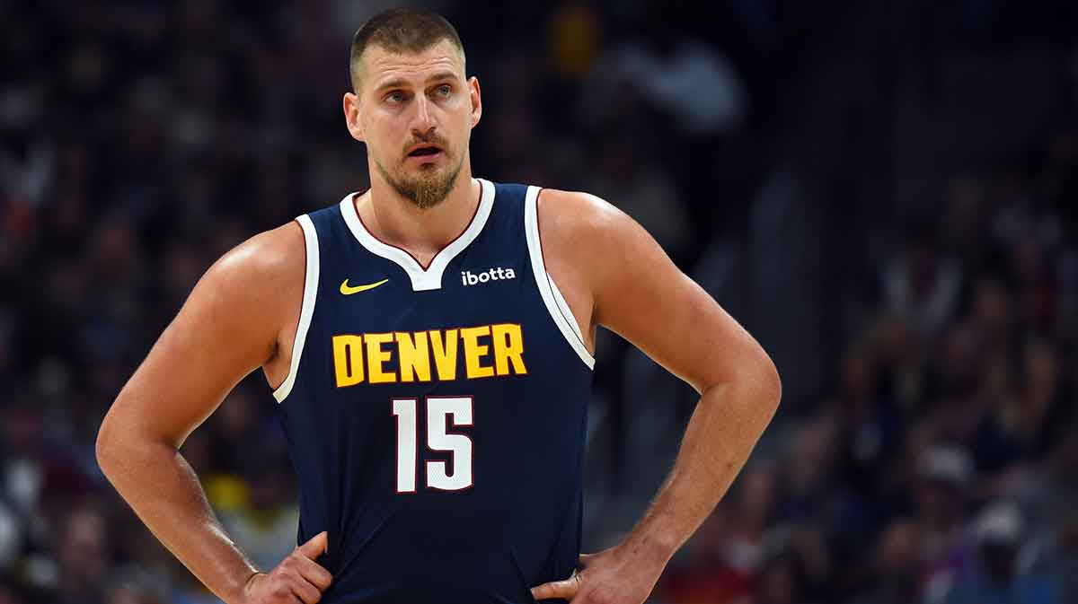 Nuggets center Nikola Jokic stands