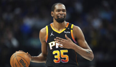 Phoenix Suns forward Kevin Durant gestures during the second half of an NBA basketball game on Marc...