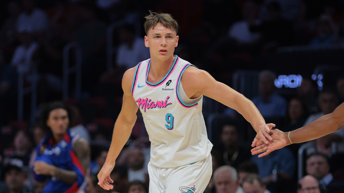 Miami Heat guard Pelle Larsson (9) celebrates after scoring against the Philadelphia 76ers during the first quarter at Kaseya Center.