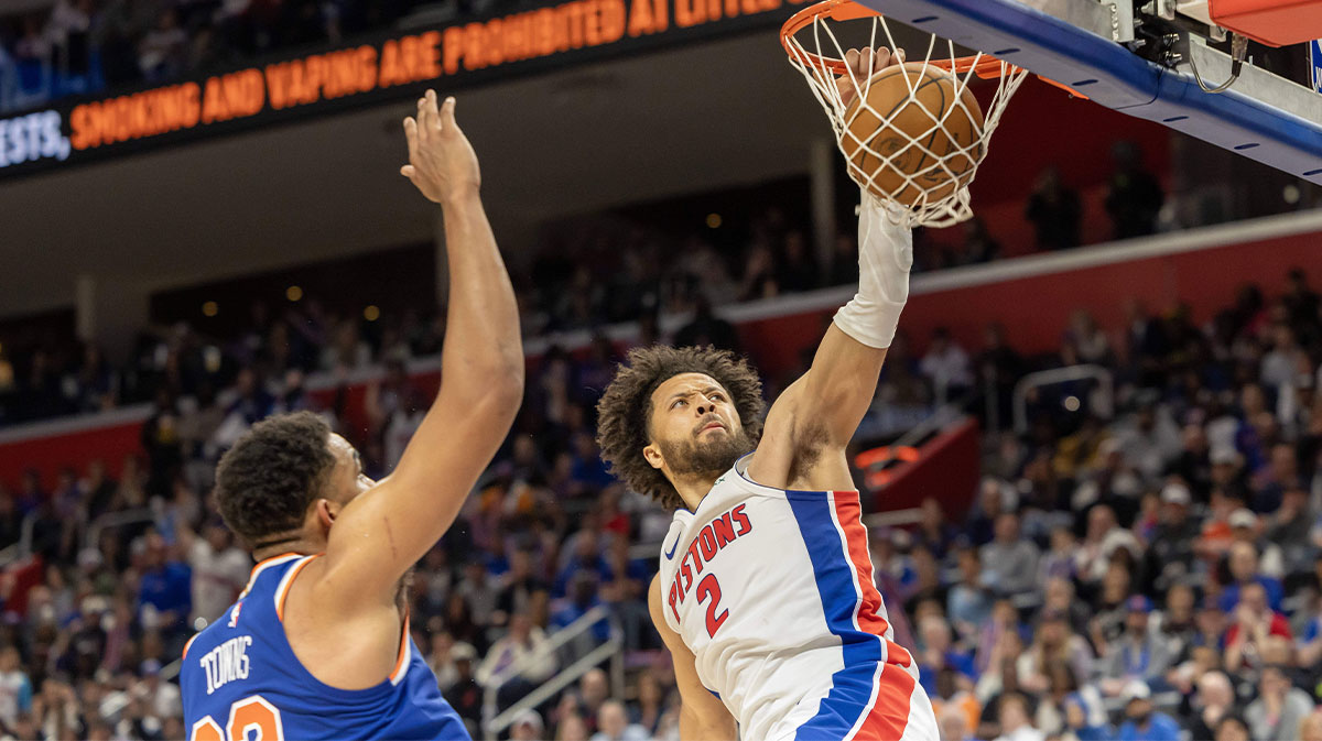 Pistons guard Cade Cunningham (2) slam dunks