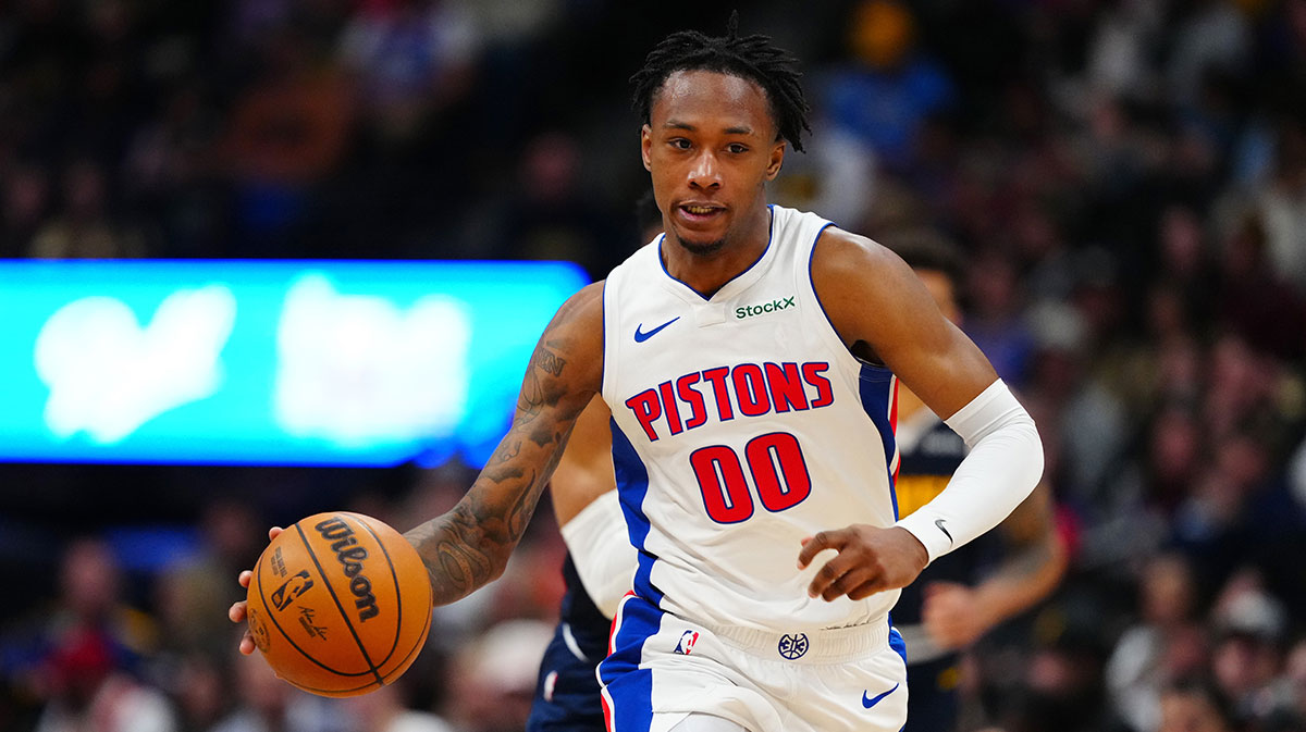 Detroit Pistons forward Ronald Holland II (00) dribbles up court in the second half against the Denver Nuggets at Ball Arena.