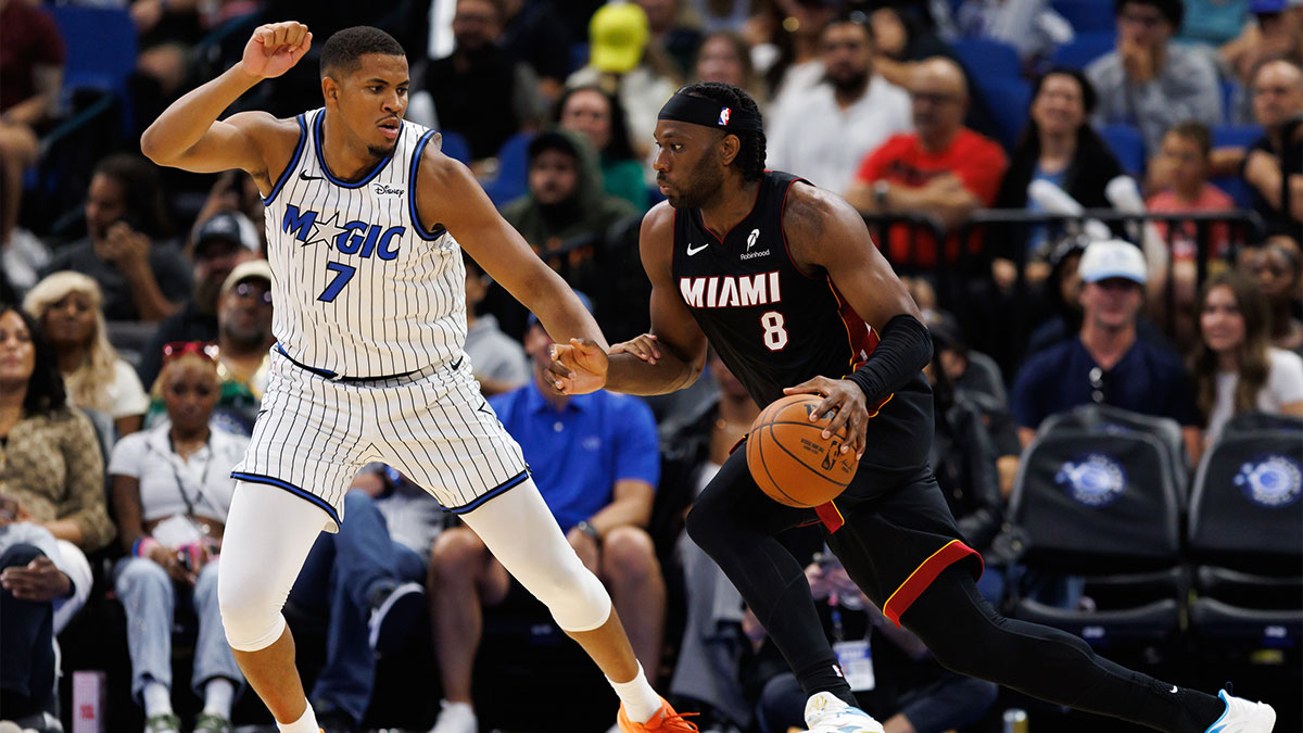 Miami Heat forward Precious Achiuwa (5) drives to the basket against Orlando Magic center Orlando Robinson (7) during the second half at Kia Center.