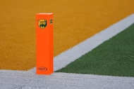 A pylon shows a logo for the Big 12 Conference and Baylor during the first half of an NCAA...