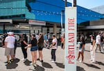 FILE - People wait in line for shirts at the launch party for the Fire, Portland’s new WNBA team, at the Moda Center in Portland, Ore., July 15, 2025. 