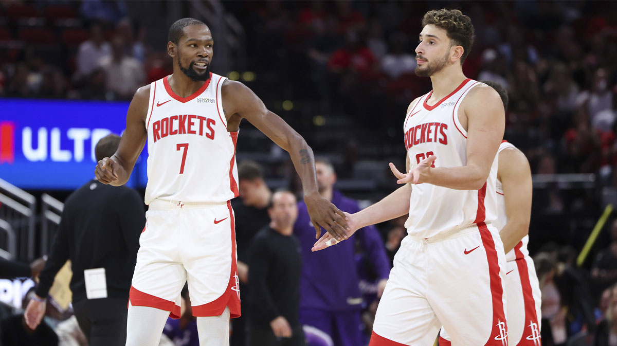 Houston Rockets forward Kevin Durant (7) reacts with center Alperen Sengun (28) after a play during the third quarter against the Utah Jazz at Toyota Center.