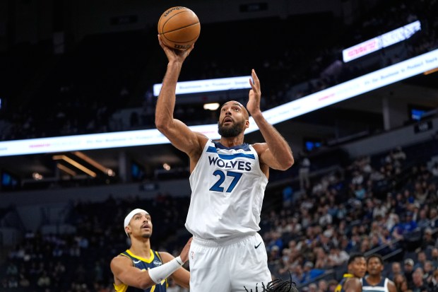 Rudy Gobert shoots a basketball.