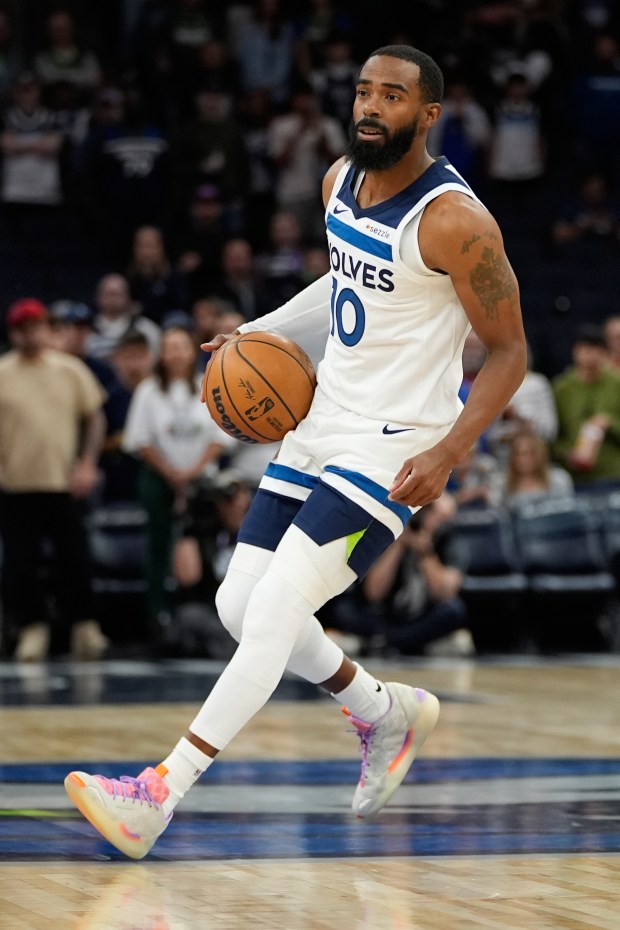 Mike Conley dribbles