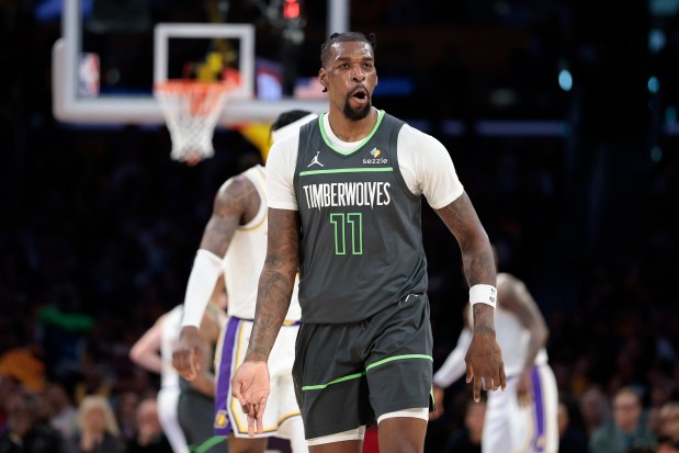 Naz Reid celebrates on the basketball court.