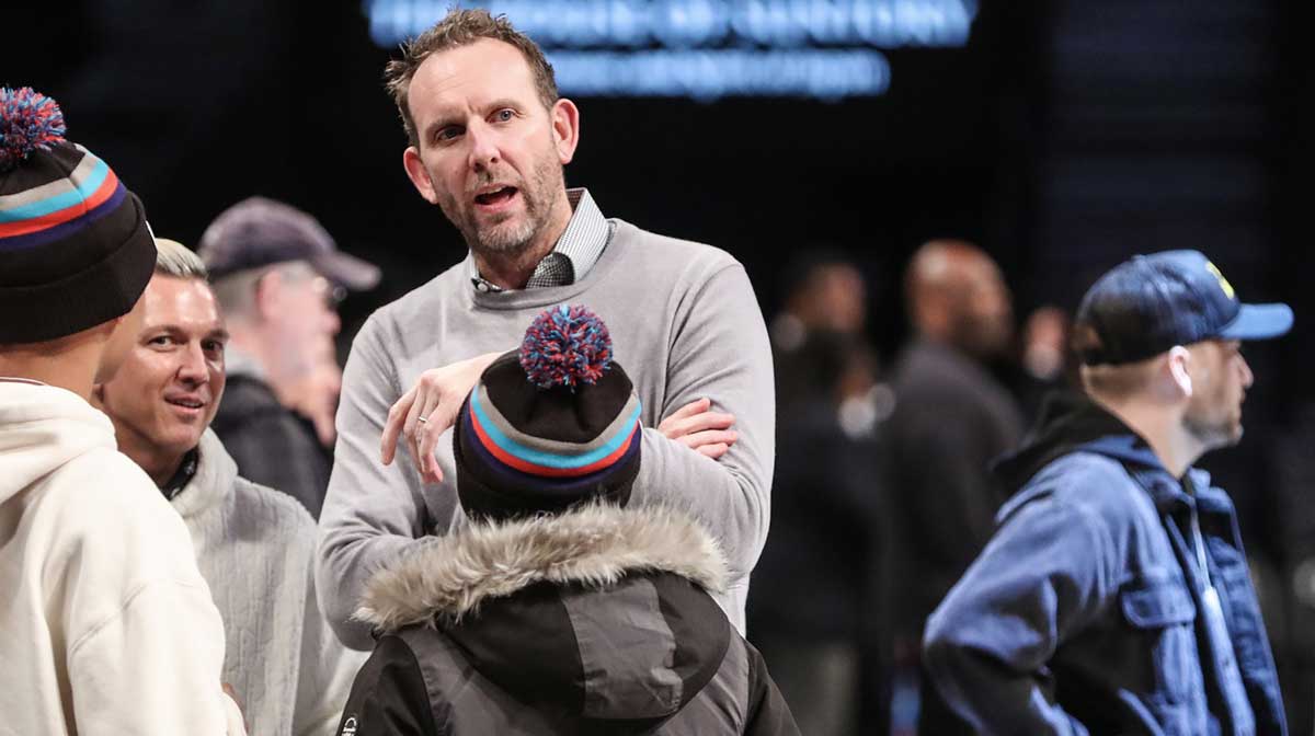 Brooklyn Nets General Manager Sean Marks (left) speaks to head coach Jordi Fernandez (right) during media day at HSS Training Center.