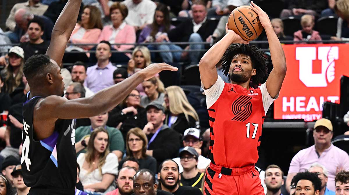 Portland Trail Blazers guard Shaedon Sharpe (17) attempts a shot over Utah Jazz forward Oscar Tshiebwe (34) in the second half at Delta Center.