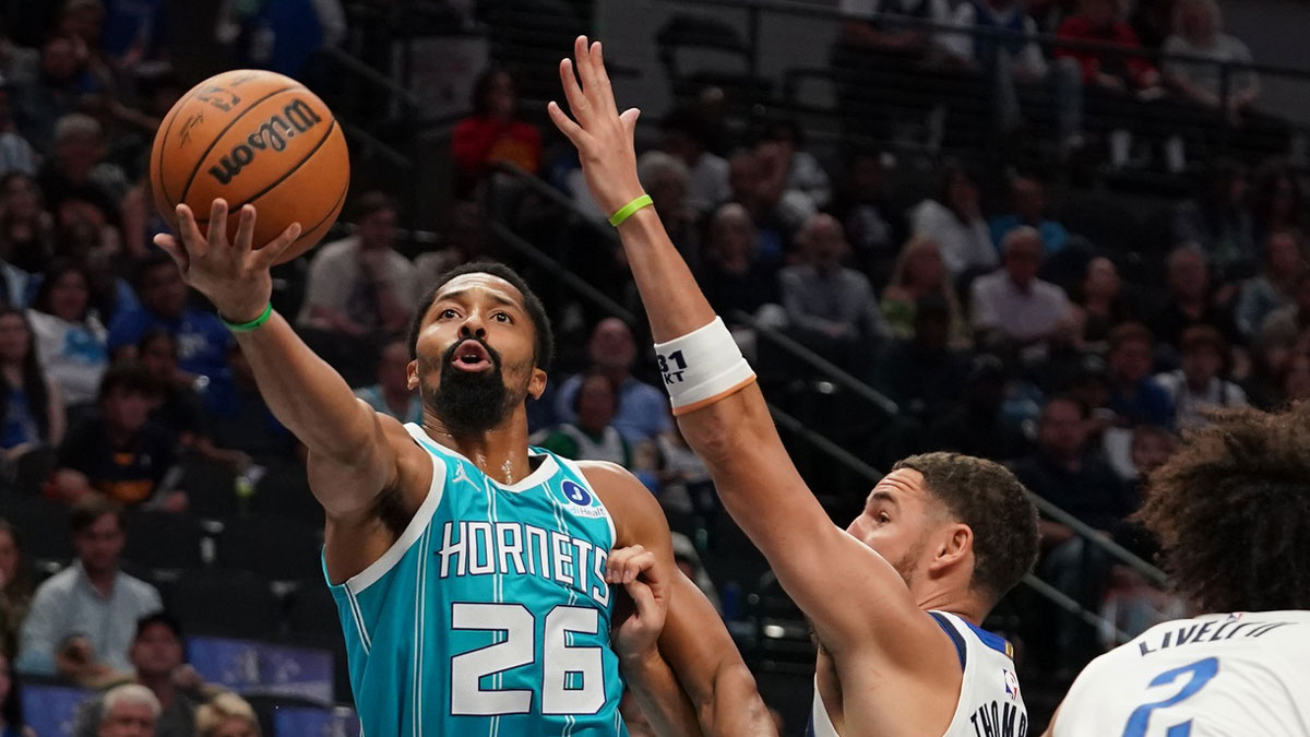 Charlotte Hornets guard Spencer Dinwiddie (26) drives past Dallas Mavericks guard Klay Thompson (31) in the first half of a game at American Airlines Center.