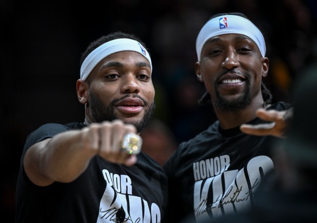 Bruce Brown (11) of the Indiana Pacers flashes his championship ring as he stands beside former teammate Kentavious Caldwell-Pope (5) of the Denver Nuggets before the first quarter at Ball Arena in Denver on Sunday, Jan. 14, 2024. (Photo by AAron Ontiveroz/The Denver Post)