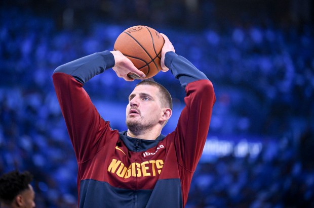 Nikola Jokic (15) of the Denver Nuggets warms up before the first quarter against the Oklahoma City Thunder at Paycom Center in Oklahoma City on Sunday, May 18, 2025. (Photo by AAron Ontiveroz/The Denver Post)