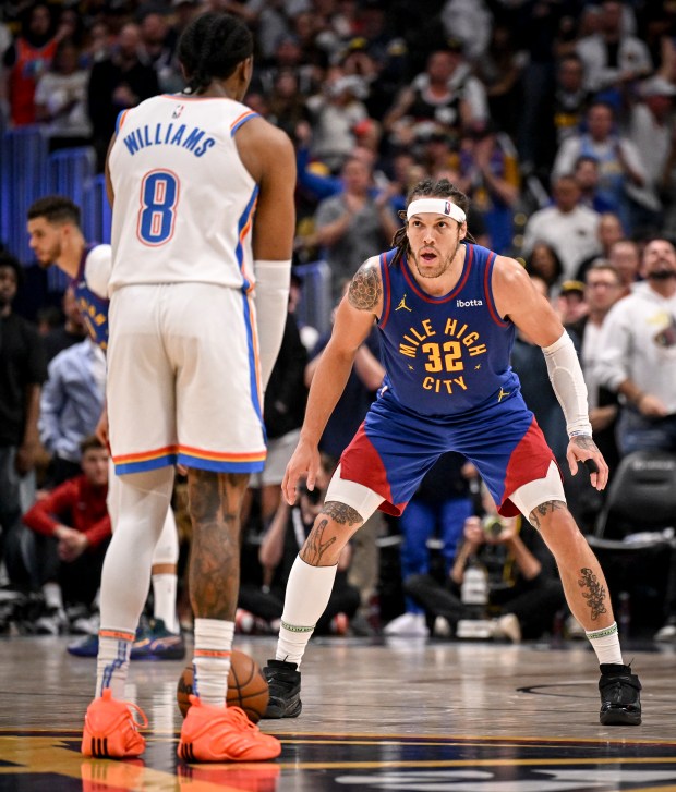 Aaron Gordon (32) of the Denver Nuggets defends Jalen Williams (8) of the Oklahoma City Thunder during the fourth quarter of the Nuggets' 113-104 overtime win at Ball Arena in Denver on Friday, May 9, 2025. (Photo by AAron Ontiveroz/The Denver Post)