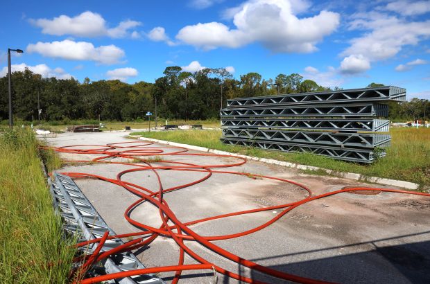 Fiber optic conduit lays across Torino Road at Monza Court...