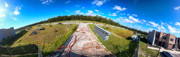 Fiber optic conduit lays across Torino Road at Monza Court...
