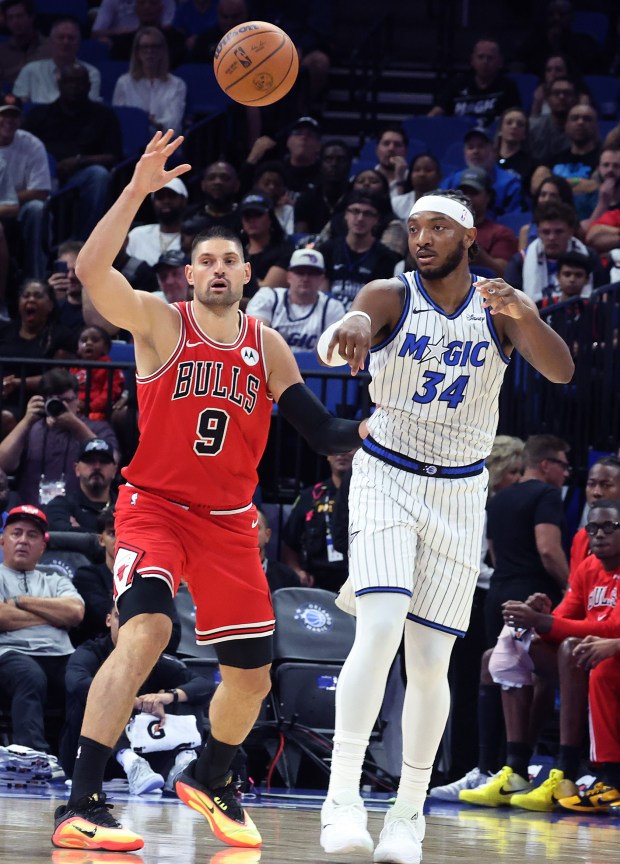 Orlando center Wendell Carter Jr. (34) passes in front of...