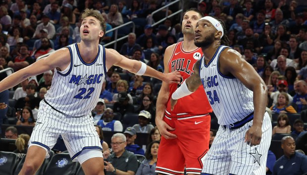 Orlando forward Franz Wagner (22) and center Wendell Carter Jr....