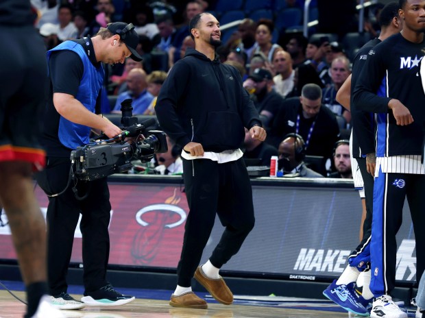 Injured Orlando guard Jalen Suggs dances for the camera before...