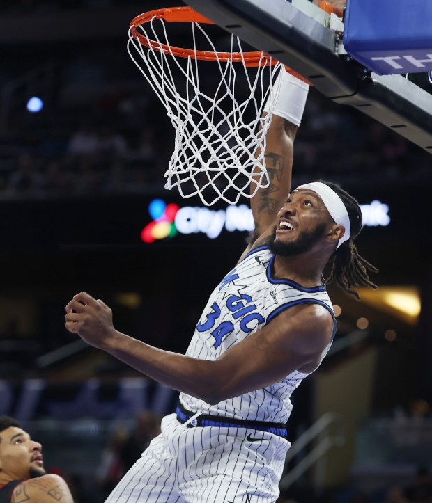 Orlando center Wendell Carter Jr. slam dunks during the Miami...