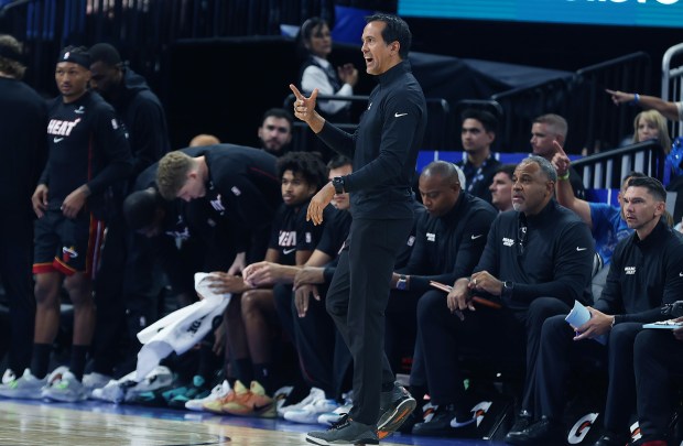 Miami coach Erik Spoelstra yells during the Miami Heat at...